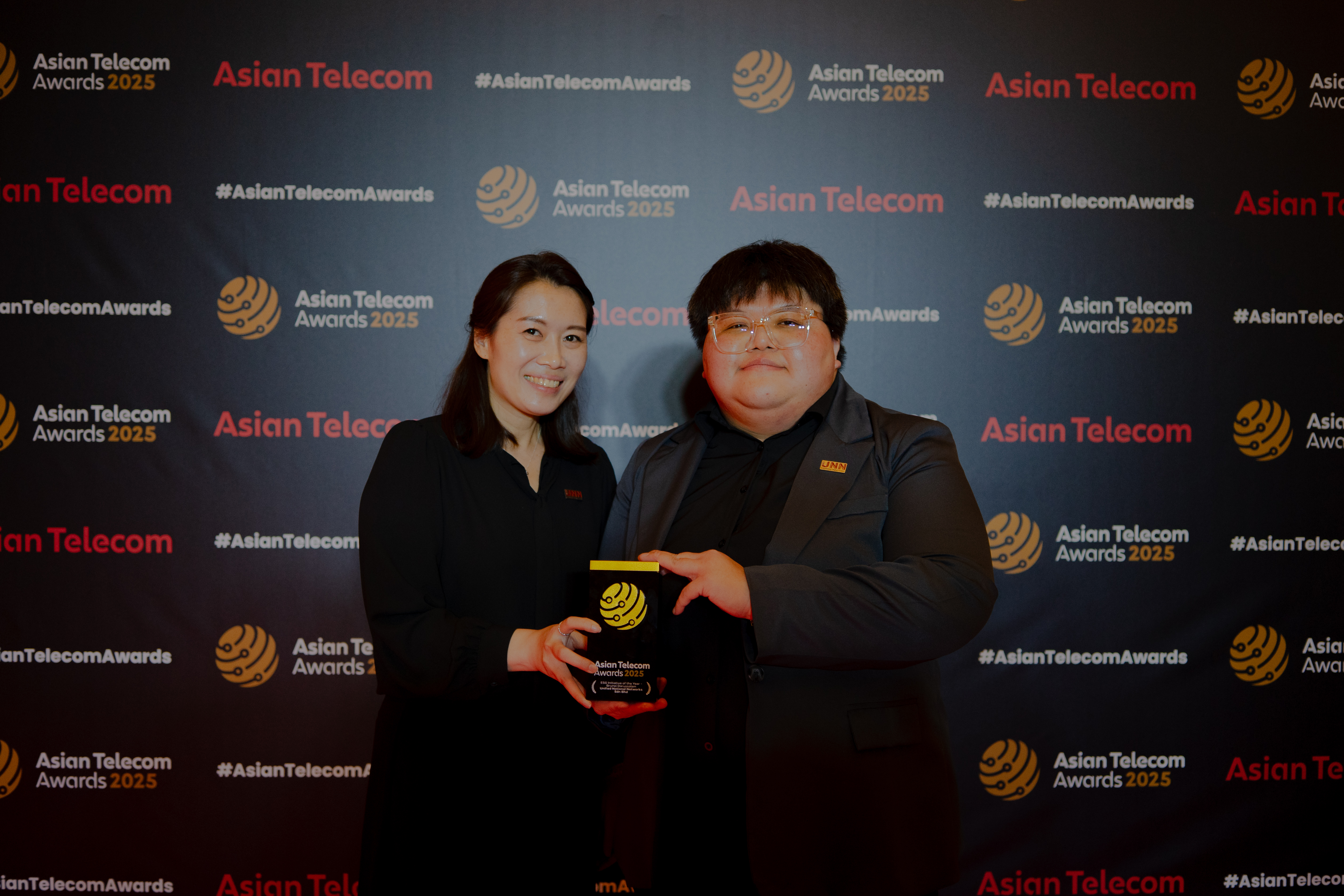 Pic 3 - UNN Won ESG Initiative of the Year at ATA2025 - UNN Head of Academy Regina Goh and UNN Head of Facilities Christine Leong holding the ESG Initiative of the Year Award at ATA2025 (1)